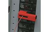 A lockout device on a circuit breaker.
