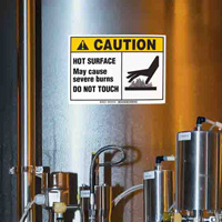 A sign warning of hot surfaces.