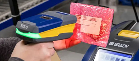 An employee scans a product's barcode.