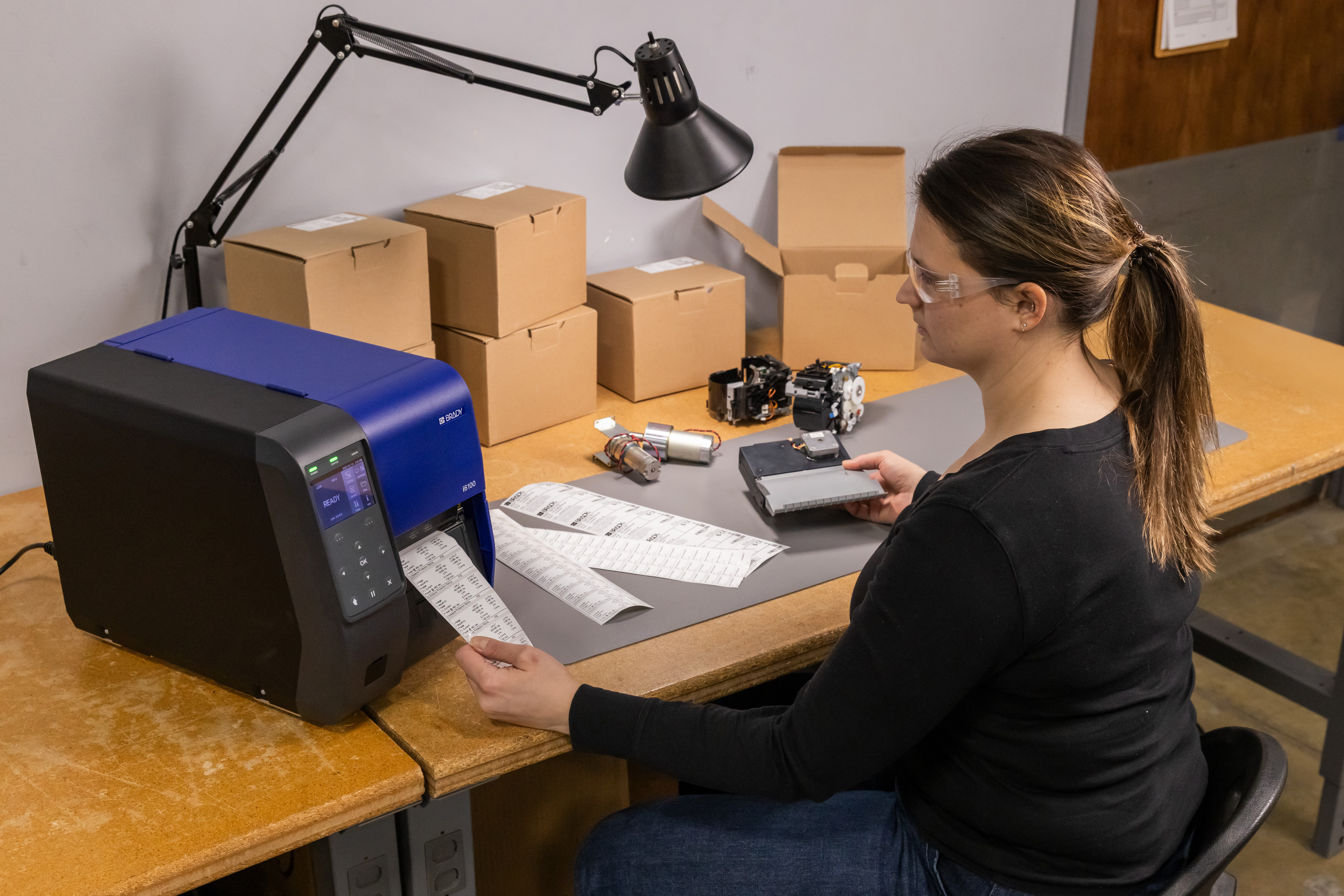 Printer with labels on table