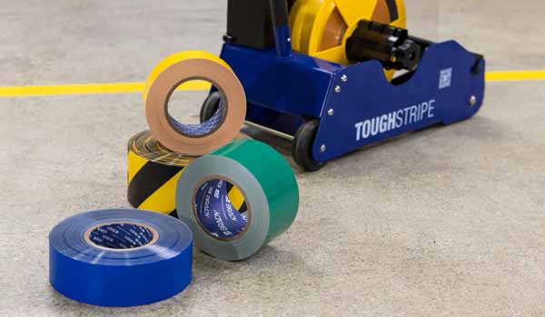 A variety of floor tapes and a floor tape applicator.