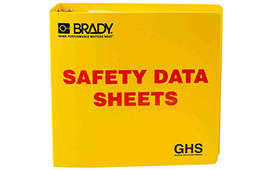 A yellow safety data sheets binder.