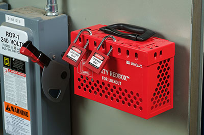 A group lockout tagout box, equipped with two padlocks and prepared for integration into the lockout tagout system.