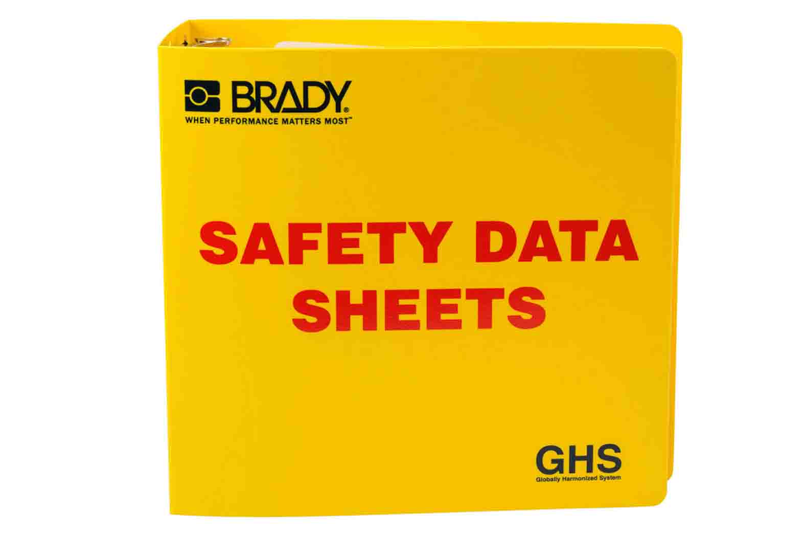 A bright yellow binder with bold, red lettering for safety data sheets.