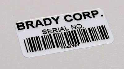 A Brady metallized polyester barcode label applied to a piece of equipment.