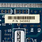 A circuit board with multiple specialty labels applied.