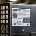 A rating plate label applied to piece of manufacturing equipment.