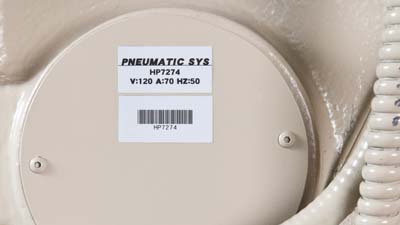 Two Brady multipurpose polyester labels applied to a piece of equipment to help identify and tracking it.