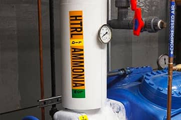 An ammonia pipemarker applied to a large industrial pipe.