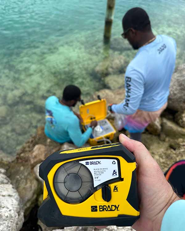 An M210 label printer being used to label samples taken from the seabed.