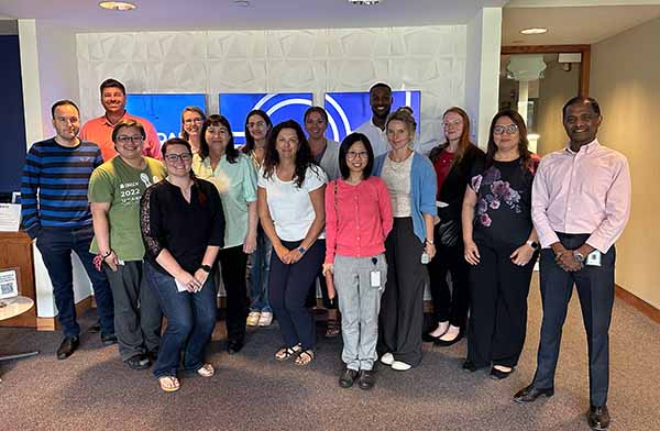 A diverse group of Brady employees with representation from many different cultural backgrounds.