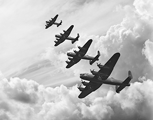 World War 2 fighter planes flying in formation.