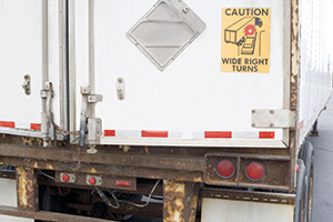 A truck lacking hazmat signs, signifying the need for proper labeling to comply with safety regulations.